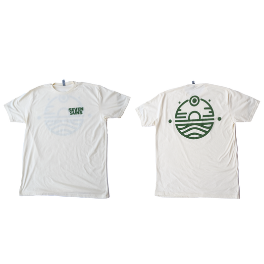 Green Seven Suns Logo on Sand colored shirt
